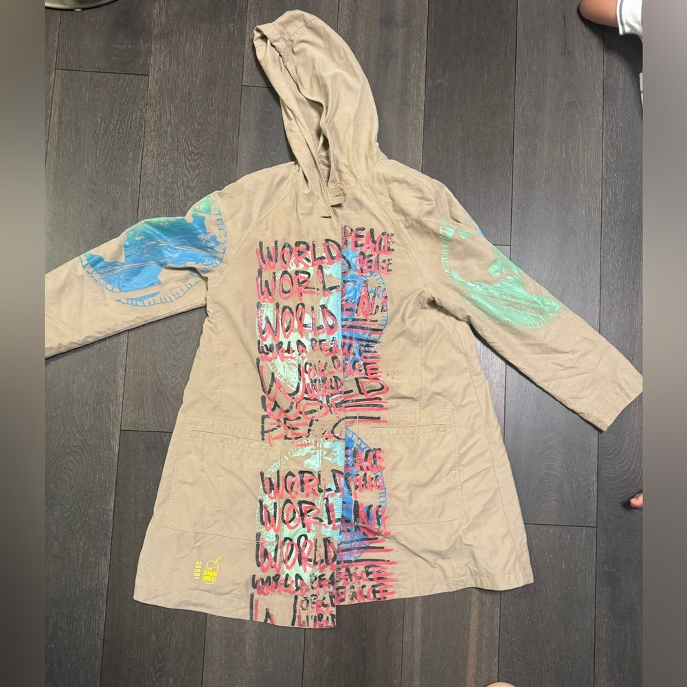 This one of a kind piece of upcycled clothing by Doodie founder of Snow Milk